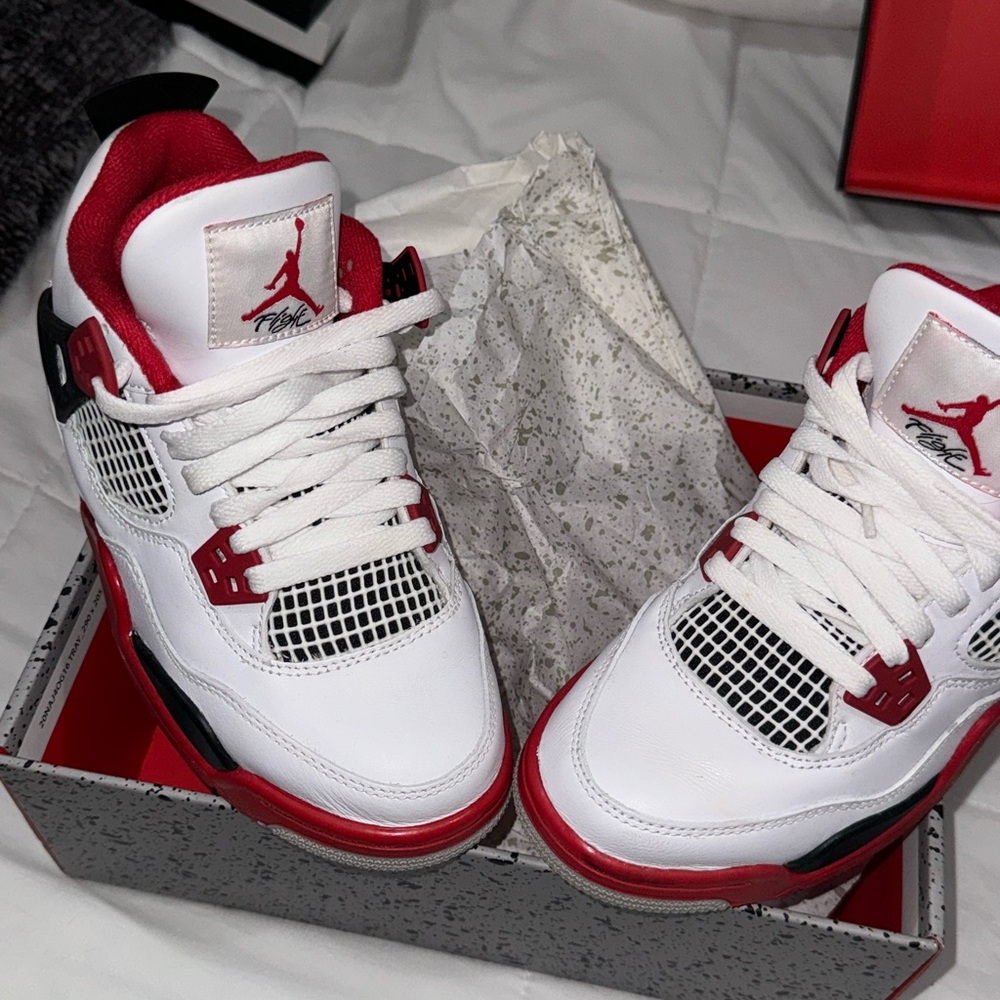 Air Jordan 4 retro GS size 4.5 (also fits women’s size 5) 
BRAND NEW WITH BOX
